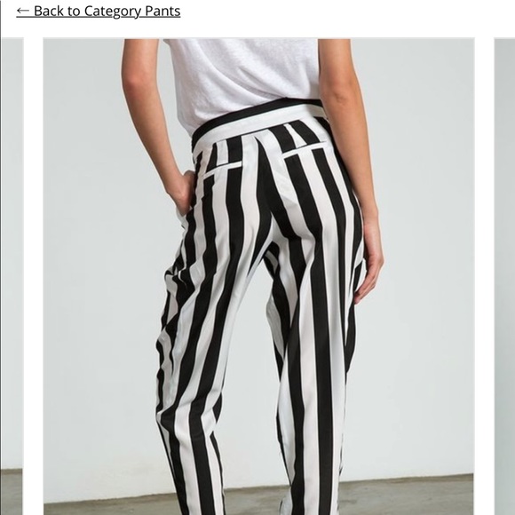 Silky b&w pants with side zipper and closure. - Picture 3 of 6